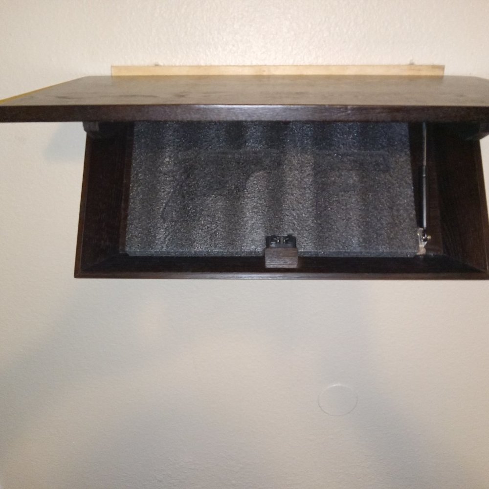 Firearm concealment shelf